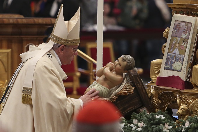 Pope_Francis_celebrates_mass_for_the_solemnity_of_the_Epiphany_in_St_Peters_Basilica_on_Jan_6_2015_Credit_Daniel_Ibanez_CNA.jpg